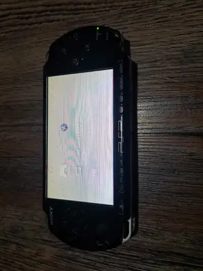 Selling a used Sony PSP model 3000, a classic handheld gaming device. Specifications: * Model: PSP 3...