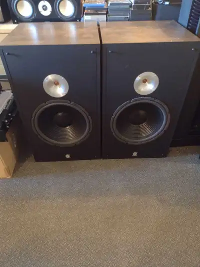 Large speakers in decent shape come with grills but missing the base stand at the bottom of them......