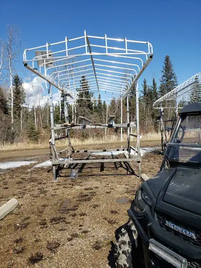 #4600 Hewitt Hi Lifter Vertical boat lift. 27 ft x 120 inch canopy, hitch, four wheels, 24 volt elec...