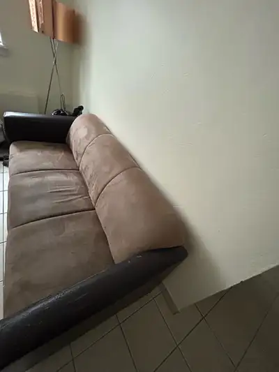 Well-maintained used sofa in good condition with some wear and tear. Firm cushions offer good suppor...