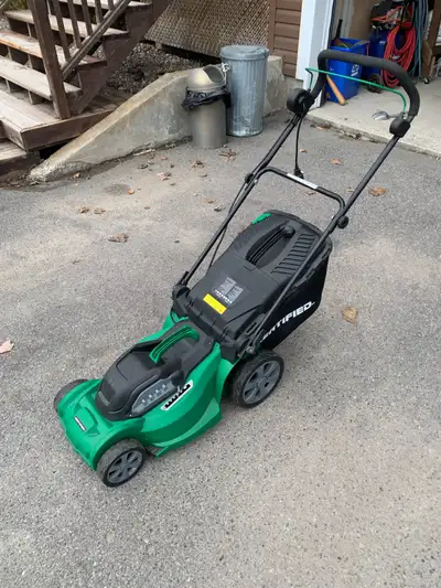 Canadian Tire “Certified” Brand Electric Lawnmower. 12A-120V Brand New - Used once by mother in law...