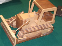 Handcrafted wooden bull dozer