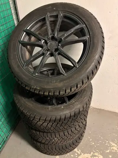 Set of 4 light alloy rims and high end snow tires. Rims: 20x8.5 Envy FF-1 (5x114.3) Tires: 255-50-20...