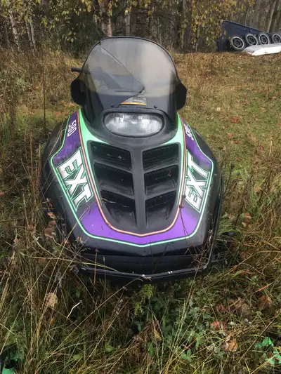 1994 Arctic cat Mountain cat 580 EXT. Back part of seat was pulled out by a bear. Needs some TLC as...