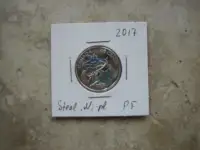 High grade Canadian 25 cent coins.