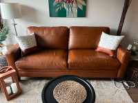 Tan couch top grain leather, foam seat cushion, 2 seater sofa.