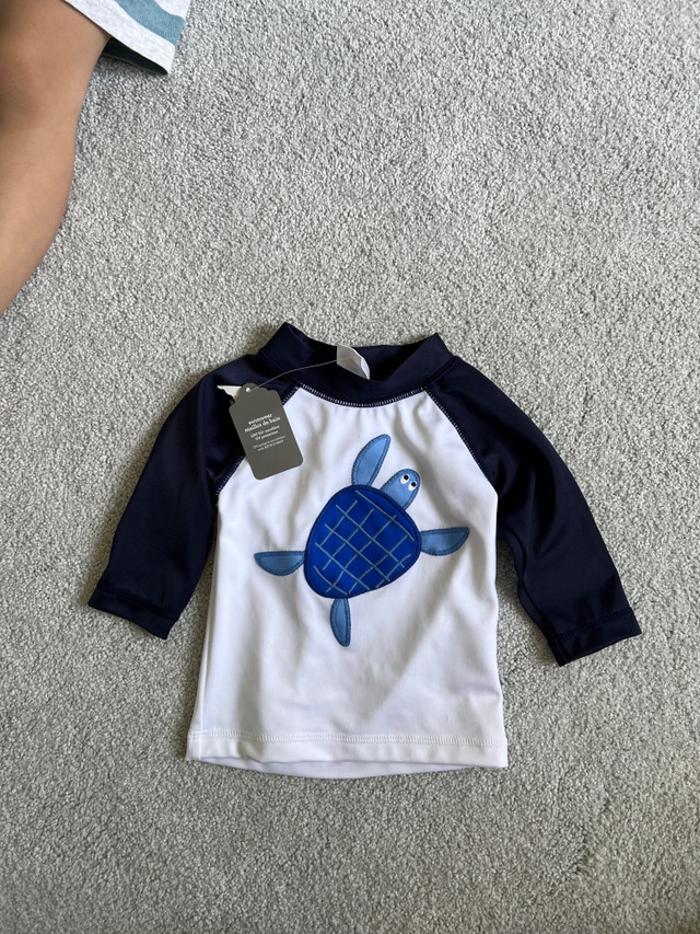 New w Tag - Long sleeve Swim Shirt - 3-6 month in Clothing - 3-6 Months in Ottawa