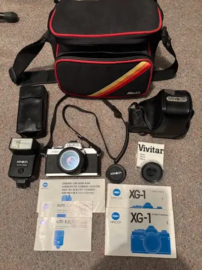 Minolta XG-1 + accessories, View more