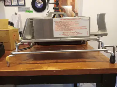 AS PICTURED TOMATOE TAMER COMMERCIAL SLICER INDUSTRIAL DESIGN SELLS FOR OVER $100 USED ONLINE $50 AD...