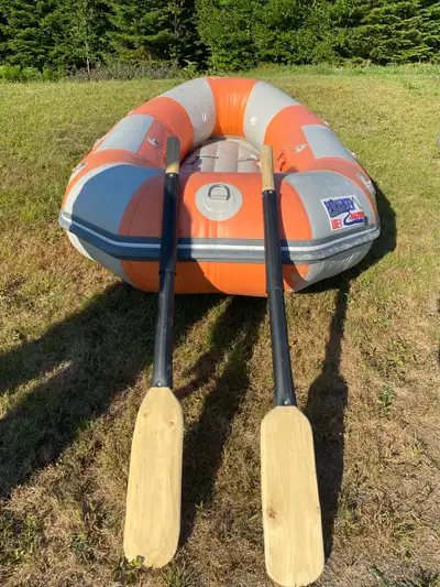 I'm selling a heavy-duty Pathfinder Lite-1 river boat, perfect for tackling white water rapids with...