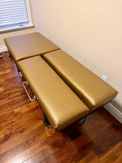 Refurbished hi-low, elevation treatment table that was an applied kinesiology technique chiropractic...