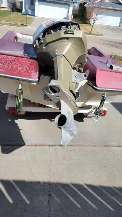 Free. Must take boat/trailer/motor. I do not know if the motor is at salvageable. The trailer is not...