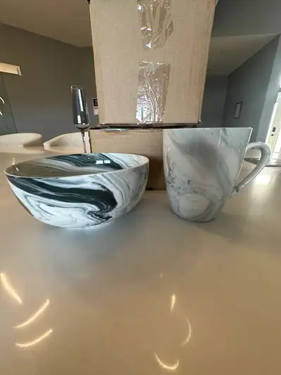 8 in total matching tea cups and small bowls. 4 of each, they have never been used. Asking $10 may b...