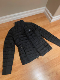 women's small black Spider jacket and Columbia jacket