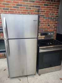Like new stainless steel fridge and glass top stove 