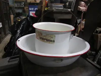 For sale I have 2 different white enamel ware pieces with red edged design. Both do have a few marks...