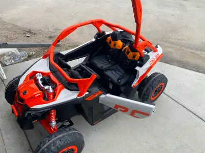 Kids Electric 24v dual battery powered sxs. Everything works as it should, lights, music, shocks, my...