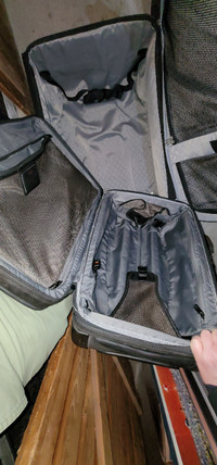 Set of 2 grey, patterned suitcases. 25$ for both.