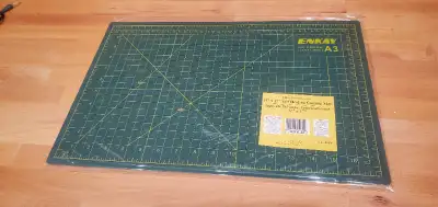 Brand new in plastic 11' x 17" mat. Use for metal, quilting, scrapbooking and sewing. Located in Dou...