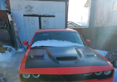 Up for grabs is the matte black hood off my 2017 Dodge Challenger Hellcat. Getting a different hood...