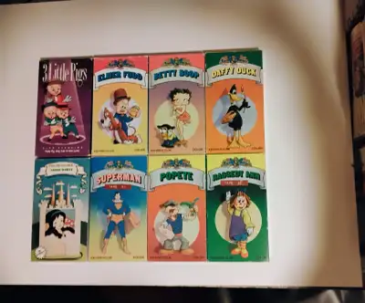 8 Retro kids cartoons as we remember them, on VHS. Asking $45