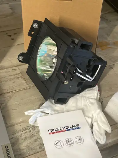 Illuminate your visuals with this brand new CTLamp projector lamp, model ET-LAD55L-M-P, designed to...