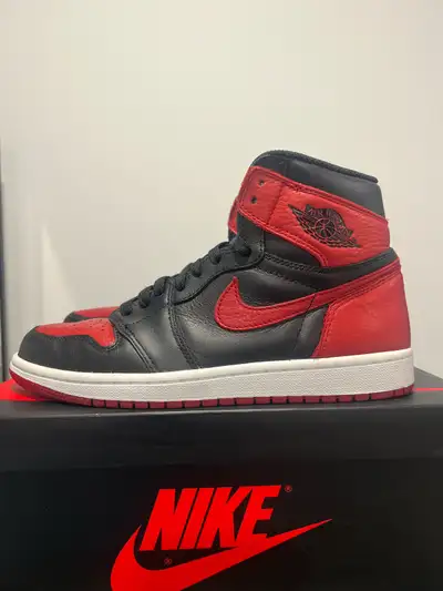 Condition in pictures. Comes with original box and extra set of red laces. Price is OBO.