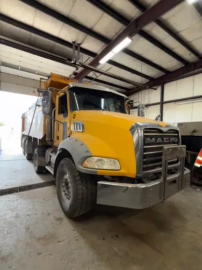 2012 Mack GU813 Tri-Axle Dump Truck Year: 2012 Make/Model: Mack GU813 Configuration: Tri-Axle Dump T...