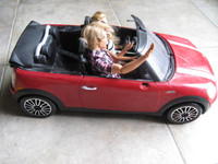 Barbie and Ken jointed dolls with red Mini Cooper S car