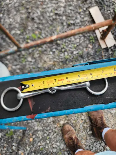 5 1/2" bridoon or can be used as a plain snaffle. Stainless steel. $15. 4 1/2" German silver eggbutt...
