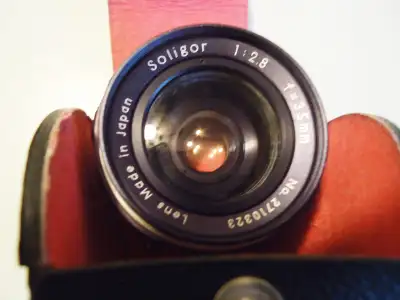 SOLIGOR 35 MM CAMERA LENS WITH CASE, View more