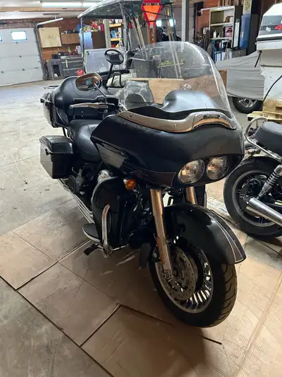 2013 Harley road glide, great shape needs nothing 38xxx km aftermarket exhaust asking 16k obo locate...