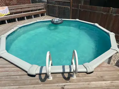 15 foot round x 5 foot deep pool. All pool accessories and toys are included. Pump, filter and autom...