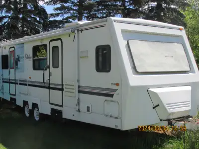 30 Foot Citation 3 Season Hard Wall Travel Trailer. Good Condition, 3 way Fridge, Stove/Oven, new Aw...