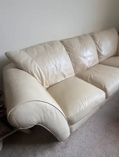 Free off white leather sofa, View more