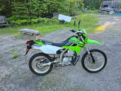 Kawasaki KLX 300 dual sport. Has 4065 km on it. Comes with. -T-rex racing, Skid plate, Engine crash...