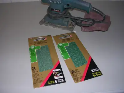 Makita 120 volt, 1.6 A. sander, uses velcro sheets, comes with one new sheet - 100 grit and one new...