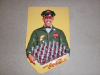 Coca Cola Delivery Man Embossed Tin Sign
