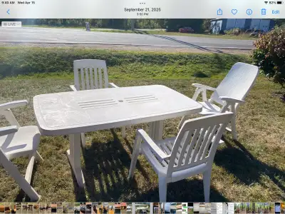 Table with 4 chairs asking 100.00 , if interested please contact thanks