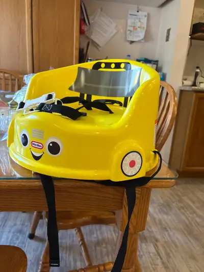 yellow “vehicle” toddler booster seat, View more