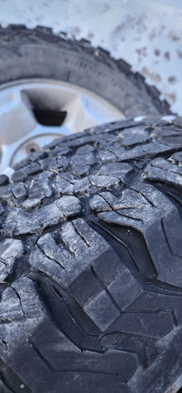 3 used tires and rims from 2011 Ford f250 super duty.
