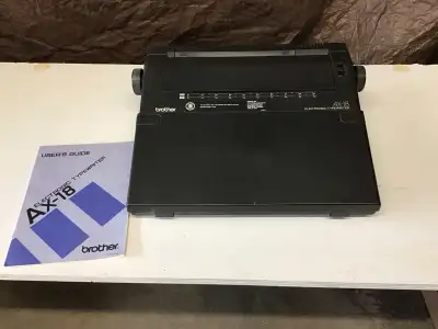 Selling a Brother AX-18 electronic typewriter that needs a new ribbon, but is otherwise in fair work...