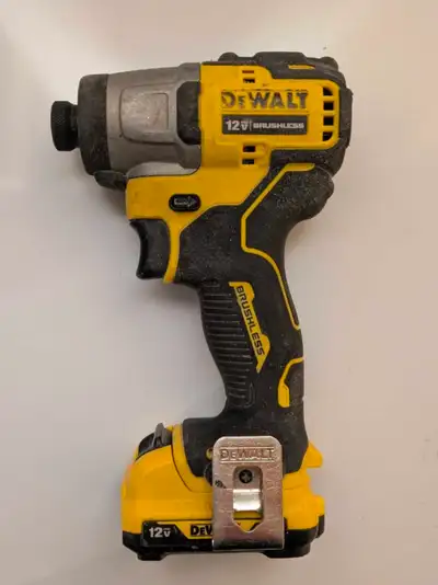 Small impact that can drive 3" screws no problem. 12V battery can be charged on a regular 20V DeWalt...