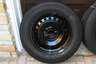 4 Firestone - 215/65/R16 98T M+S - All-Season radials mounted and balanced on steel rims. Used appro...