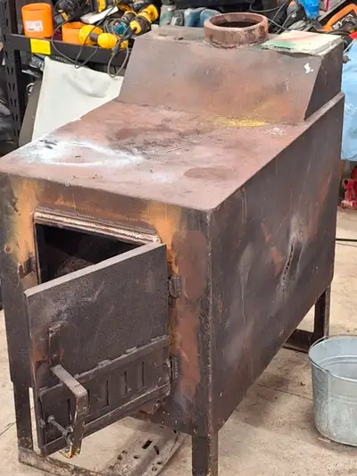 Very large homemade woodstove, View more