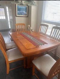 Solid wood extendable dining table with six chairs 