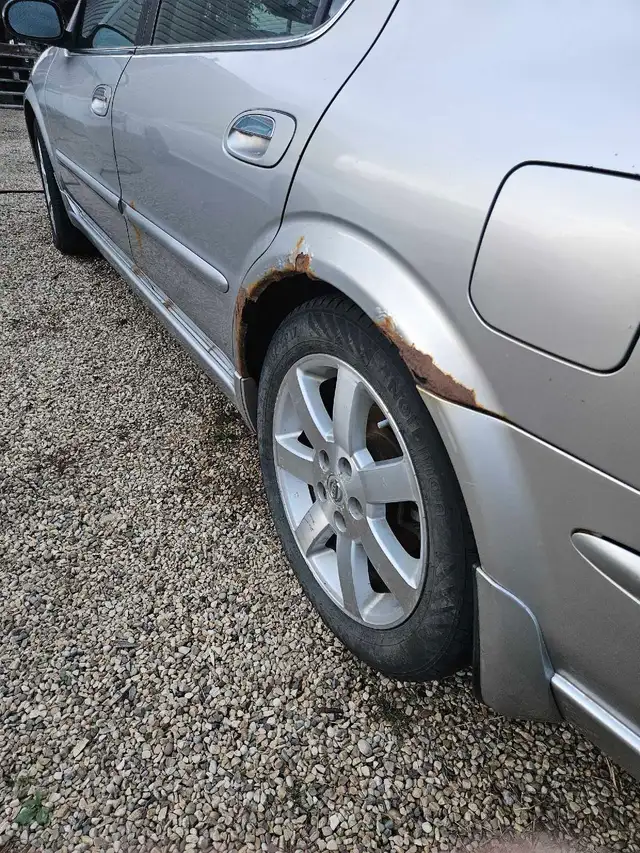2003 Nissan Maxima 557469098731776005
