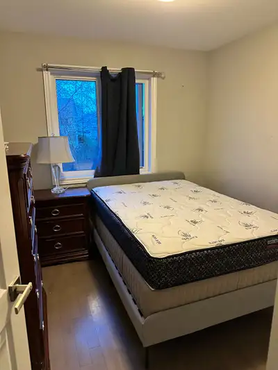 INCLUDED: - A bed frame - New queen mattress - New mattress protector - Door lock with key - Some St...