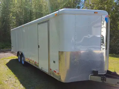 Must call 250-962-5970 if interested. 26 Foot V Neck enclosed car hauler trailer. Excellent conditio...