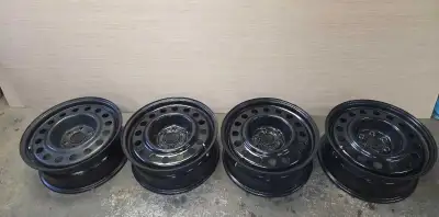 Newer and in great condition 17 inch black rims. 6-120/ET30/CB67 $100 for all 4.